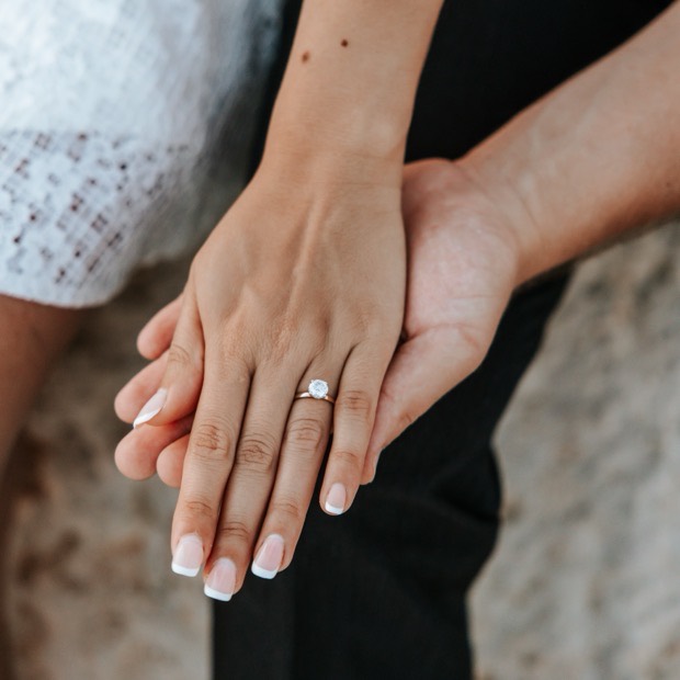 Kate's engagement ring, her hand resting on David's